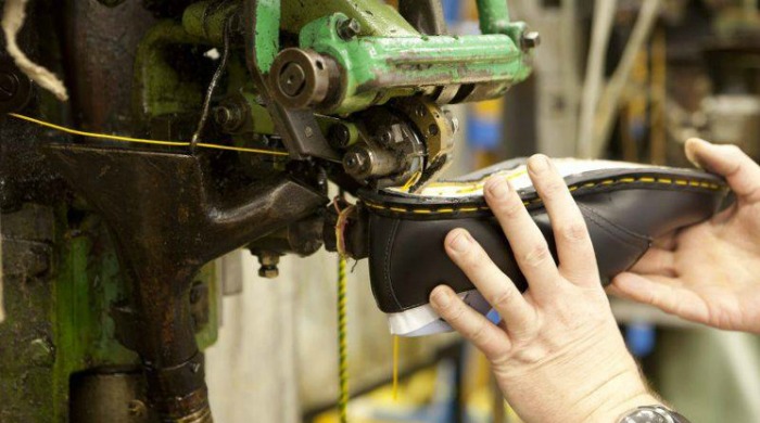 A Dr. Martens Made In England shoe being made.