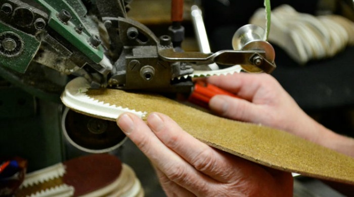 A sole being made at the Tricker's factory.