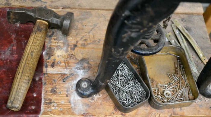 A hammer and nails at the Tricker's factory.