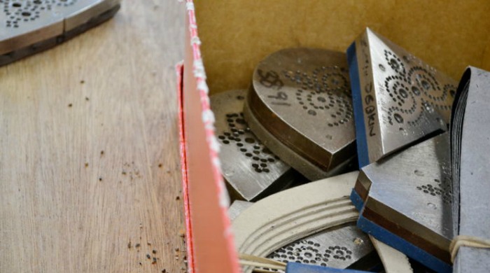 A box of different patterns for brogue detailing.