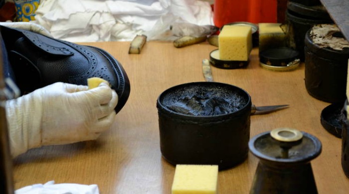 A Tricker's shoe being polished.