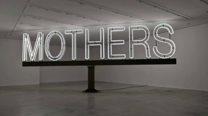 A neon sign saying "mothers" by Martin Creed.