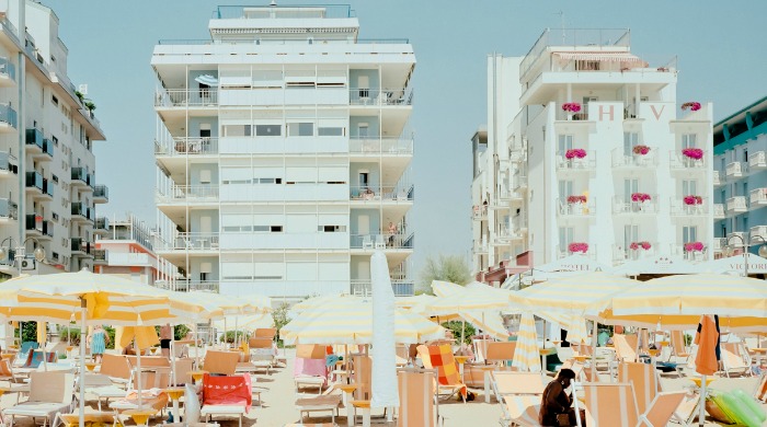 Concrete hotels and parasols on the beach from the 'Vistamar' series by Mario Dotti.