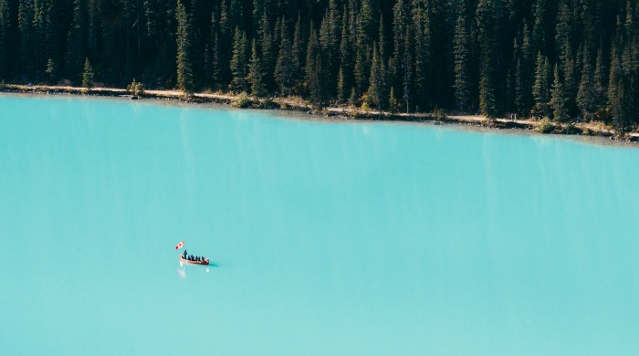 A bright blue lake in Canada by Finn Beales.