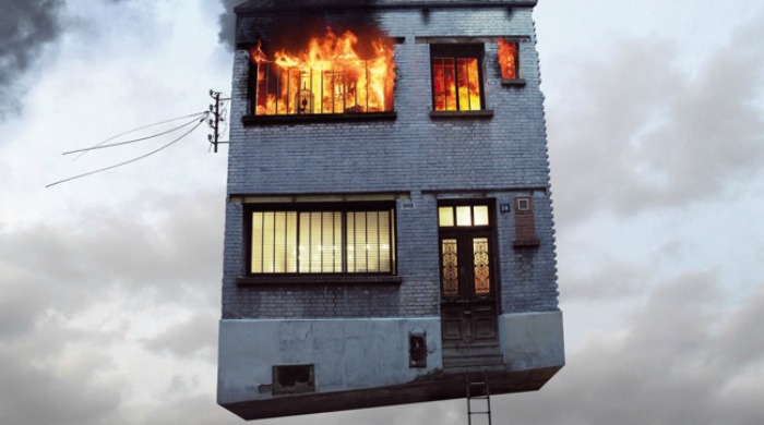 A flaming apartment block in the sky from 'Flying Houses' by Laurent Chehere.