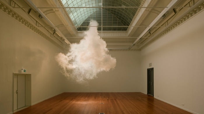 A cloud floating in a large exhibition room by Berndnaut Smilde.