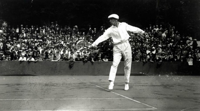 René Lacoste playing tennis.