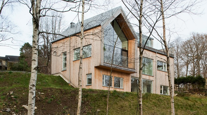 A Swedish lakeside villa called Villa Bondö, designed by Kjellgren Kaminsky Architecture.