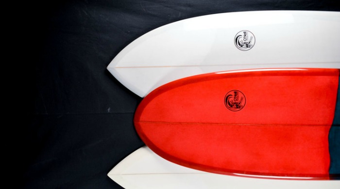 Red and white finished surfboards by Blank Surfshack.