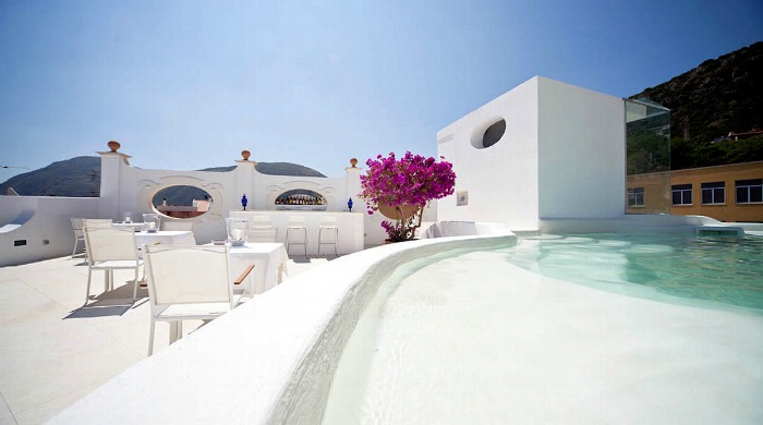 The pool and outdoor seating area at the La Settima Luna Hotel, Lipari.