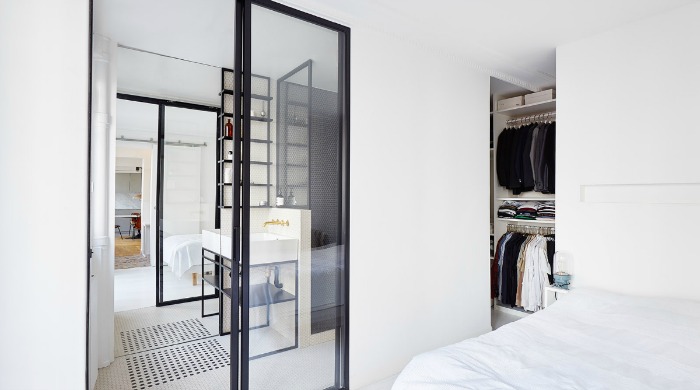 The bedroom in a monochrome Paris apartment.