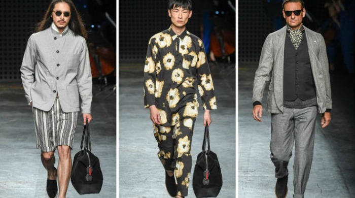 Male models on the catwalk for the London Collections Men Oliver Spencer SS16 show.