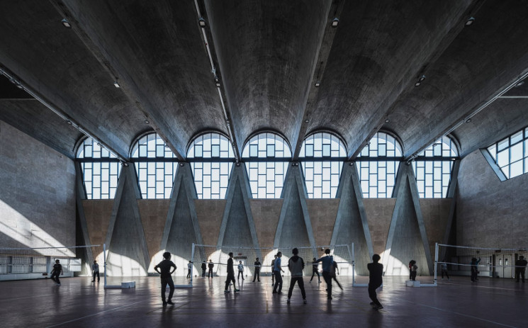 Gymnasium of the New Campus of Tianjin University, China, by Atelier Li Xinggang, photographed by Terrence Zhang
