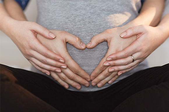 Pregnant Woman Holding Bump